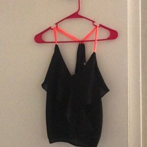 Black and neon coral ruffle tank